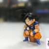 League Studio – Battle-Damaged Goku Sitting Figure Dragon Ball - Photo 1 | TopGKStore