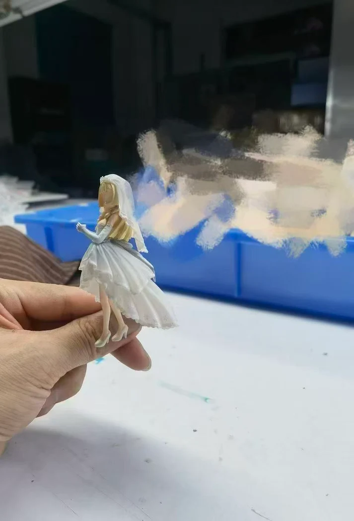 Side view showing the layered skirt and veil