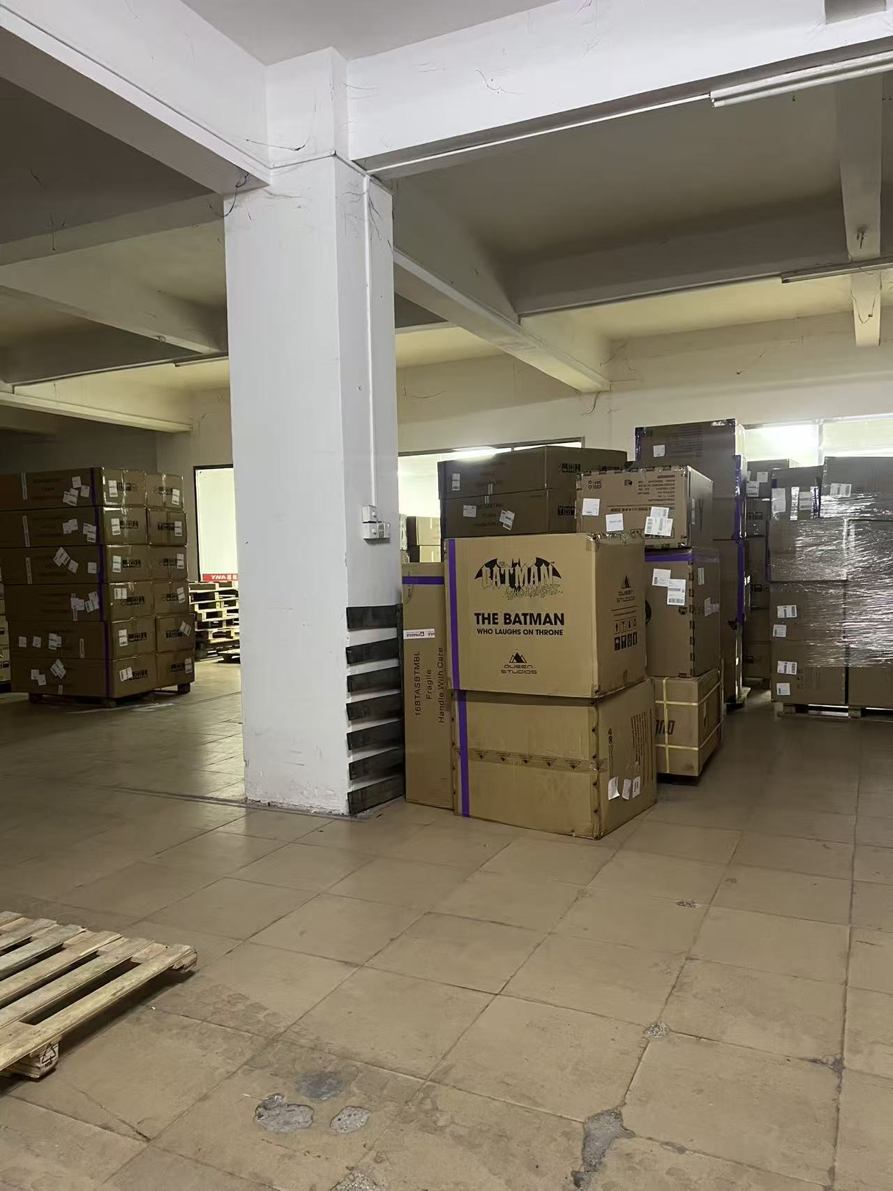 Collectible statue cartons stored inside TopGKStore's warehouse